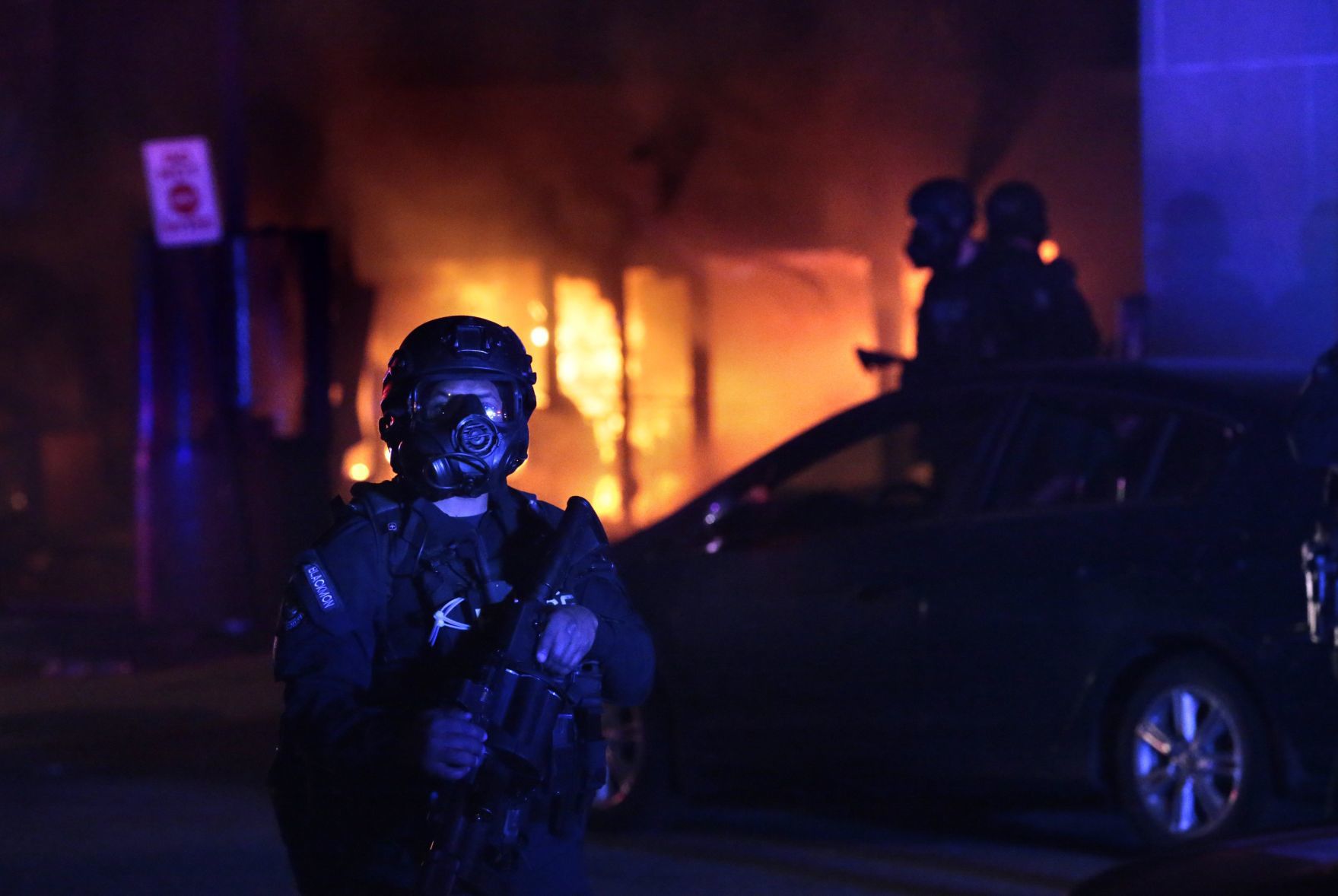 Vandals set fire to downtown 7-Eleven following protest at police station